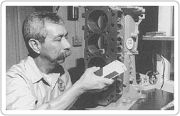 Man testing remanufactured engine